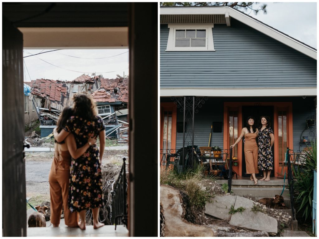 The couple looks out the door in their engagement photos at home