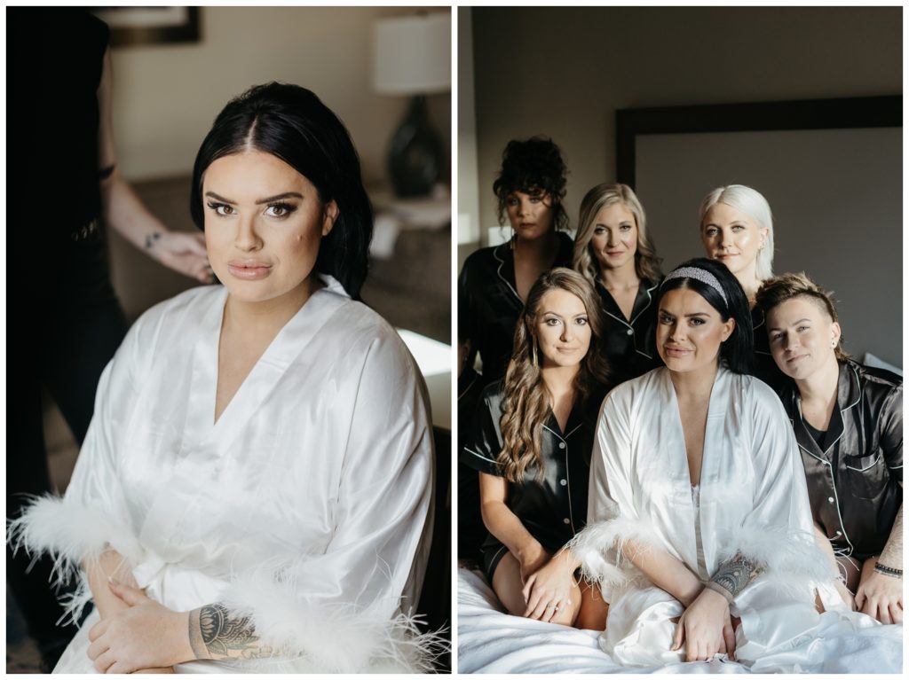 A bride sits with her wedding party 