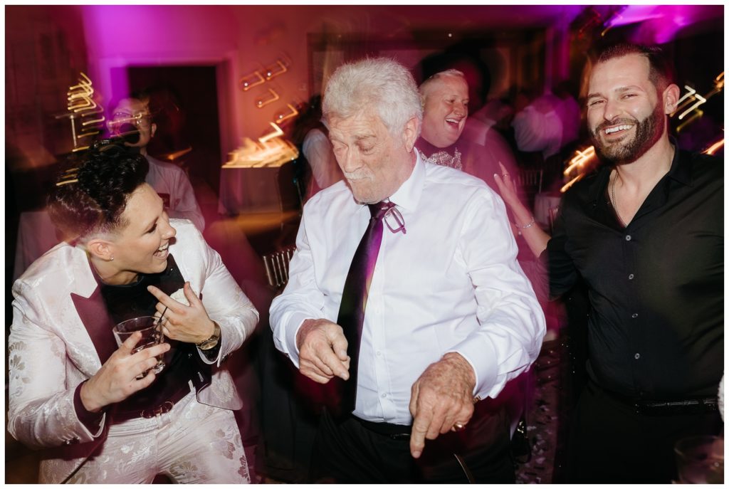 A man dances with Kayleigh at the New Years Eve wedding