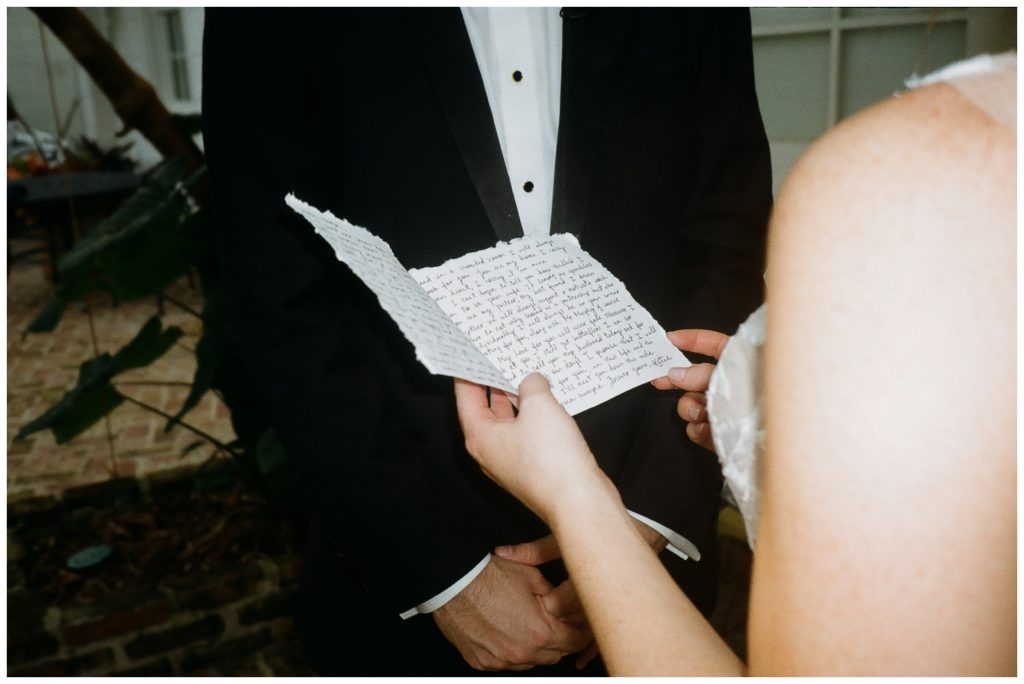 The bride holds her notebook