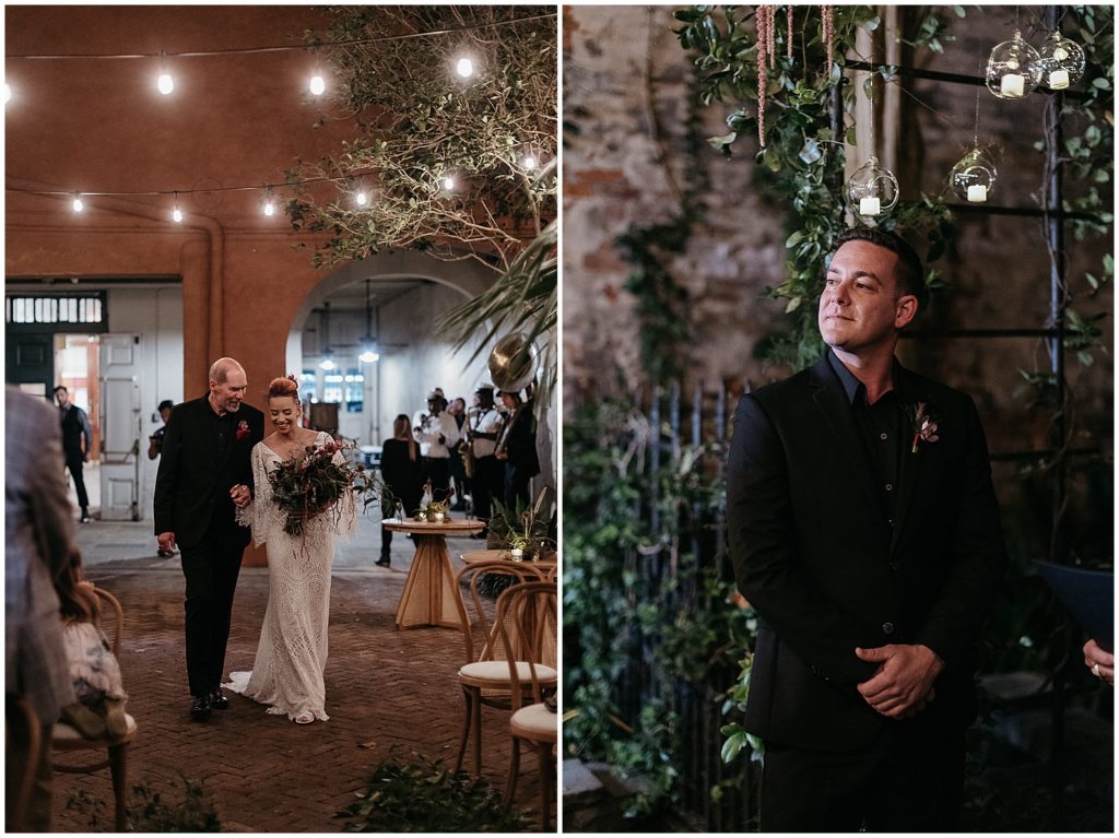 Abi walks up the aisle under strings of lights.