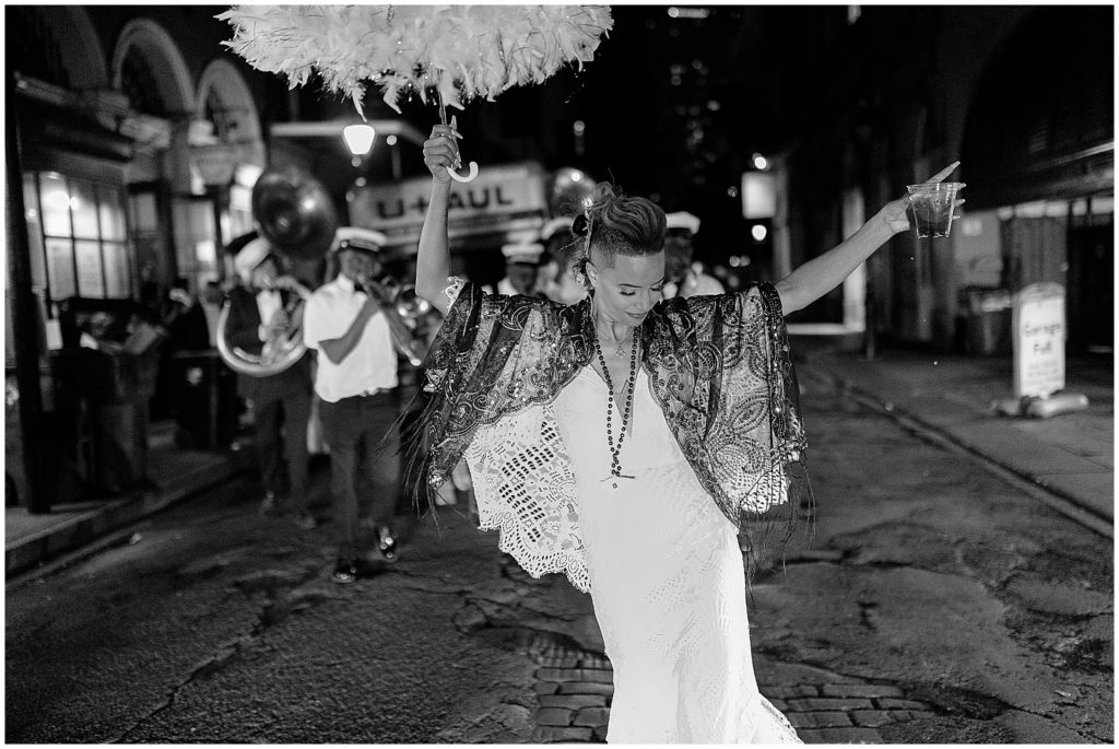 The bride leads a New Orleans wedding parade.