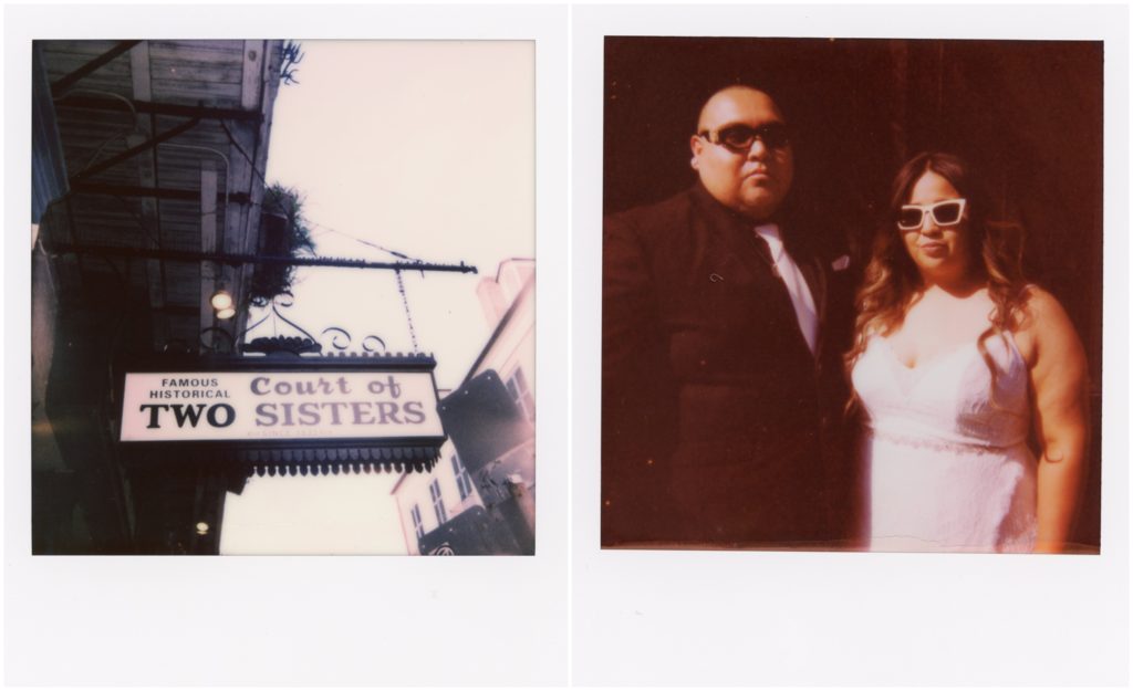 A polaroid wedding photo shows the sign for the court of two sisters.