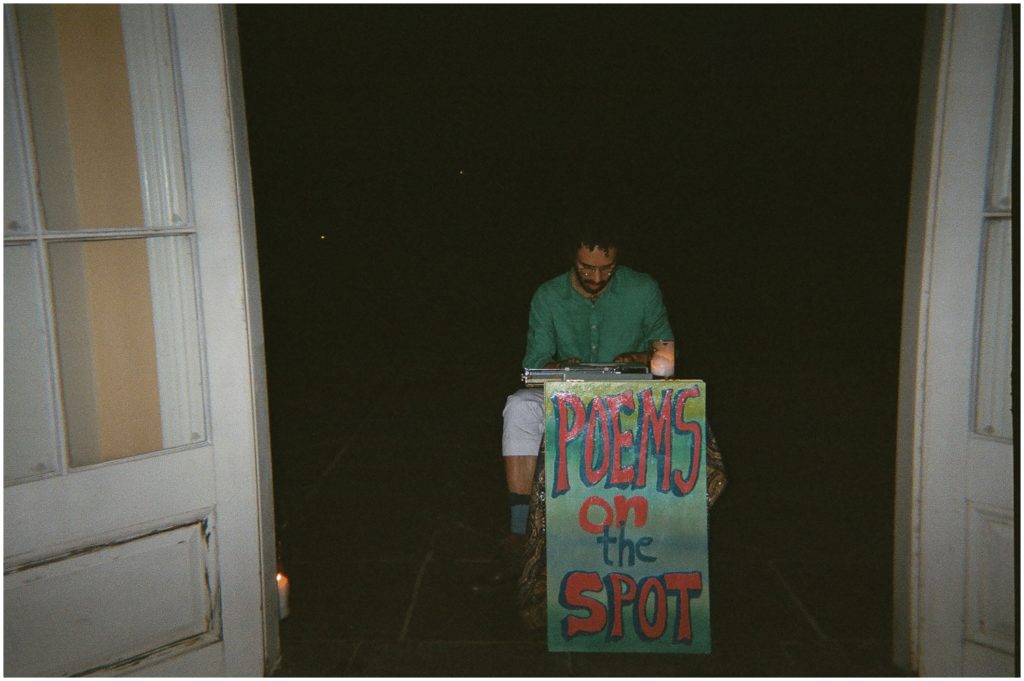 A poet sits outside at a wedding reception in New Orleans.