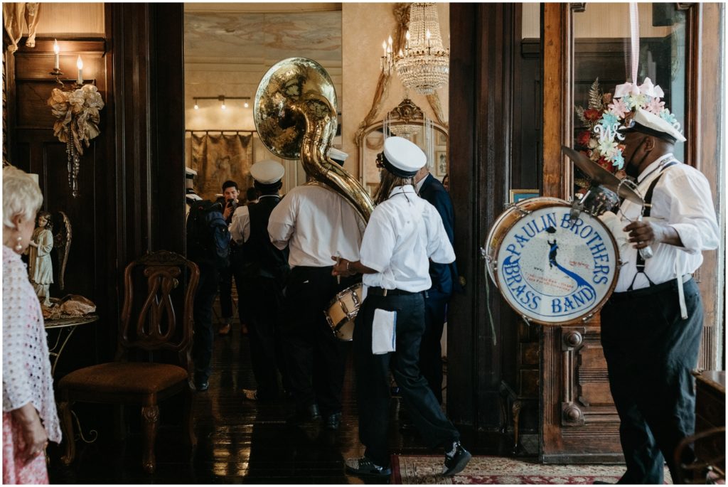 A brass band walks into a wedding venue.