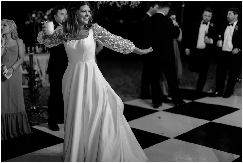 Analeah dances across the black and white floor at Rip Van Winkle Gardens.