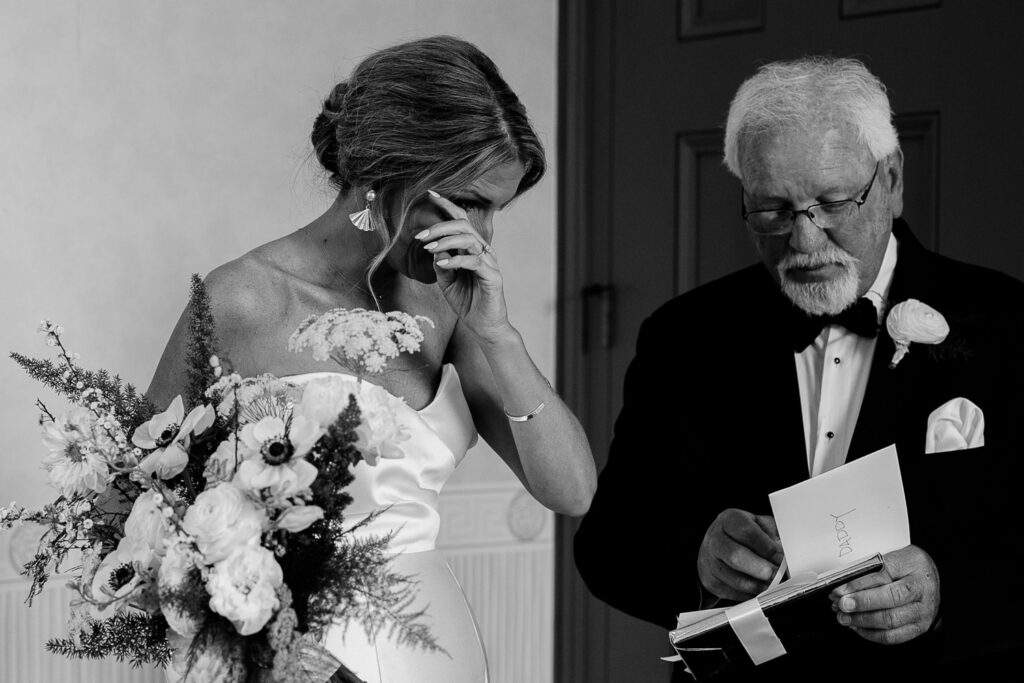 father of bride seems bride for first time