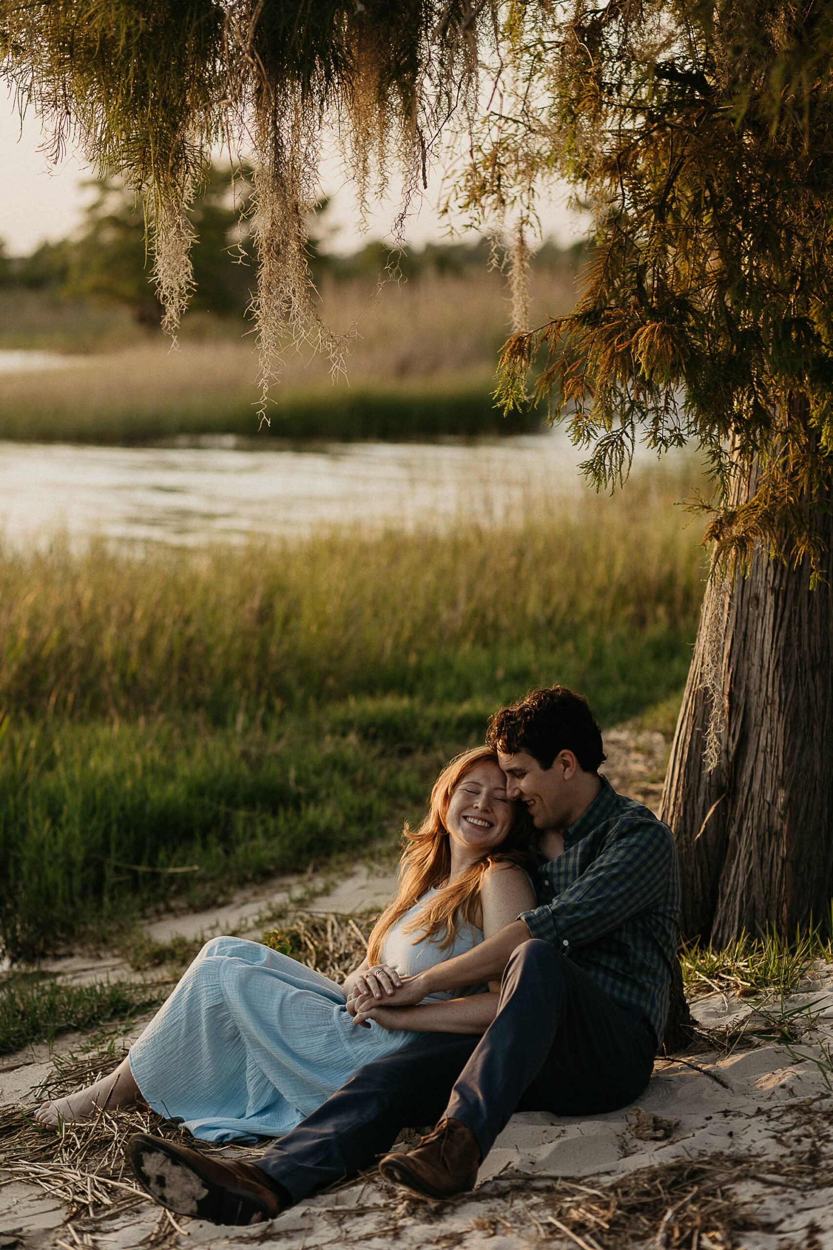 couple takes engagement photo at fontainebleau state park
