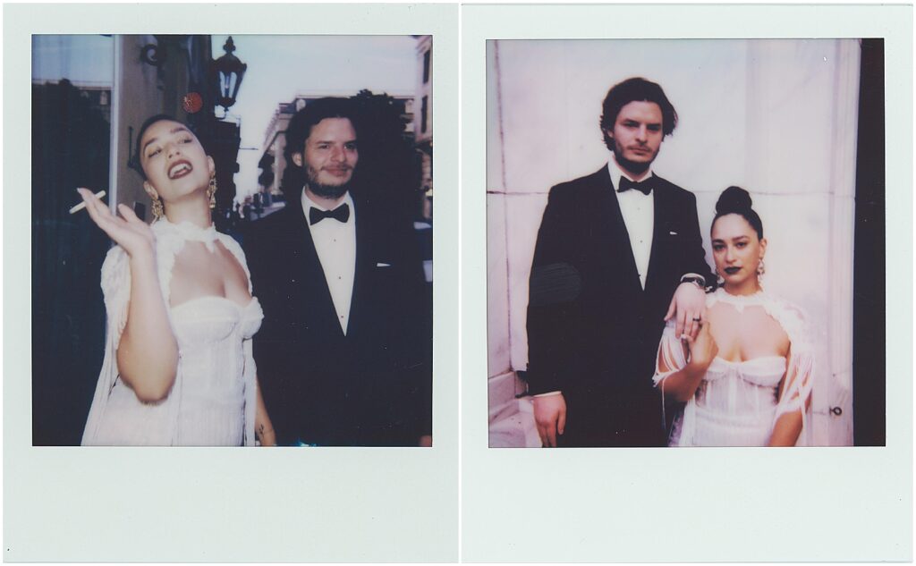 A bride sits beside a groom as they pose for a New Orleans wedding photographer in a Polaroid wedding photo.