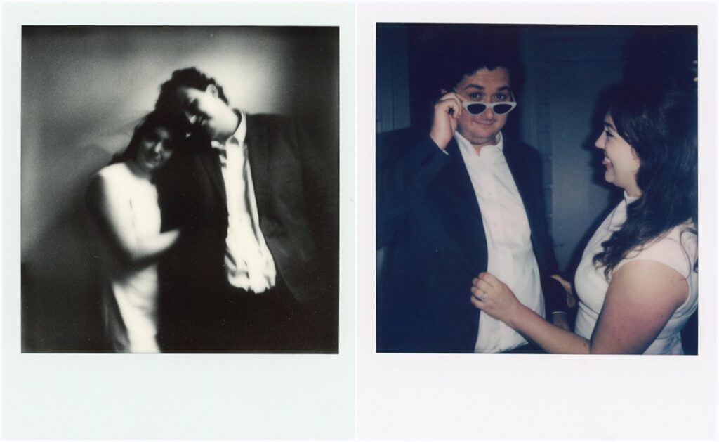 A groom puts on a bride's sunglasses in a Polaroid wedding photo.