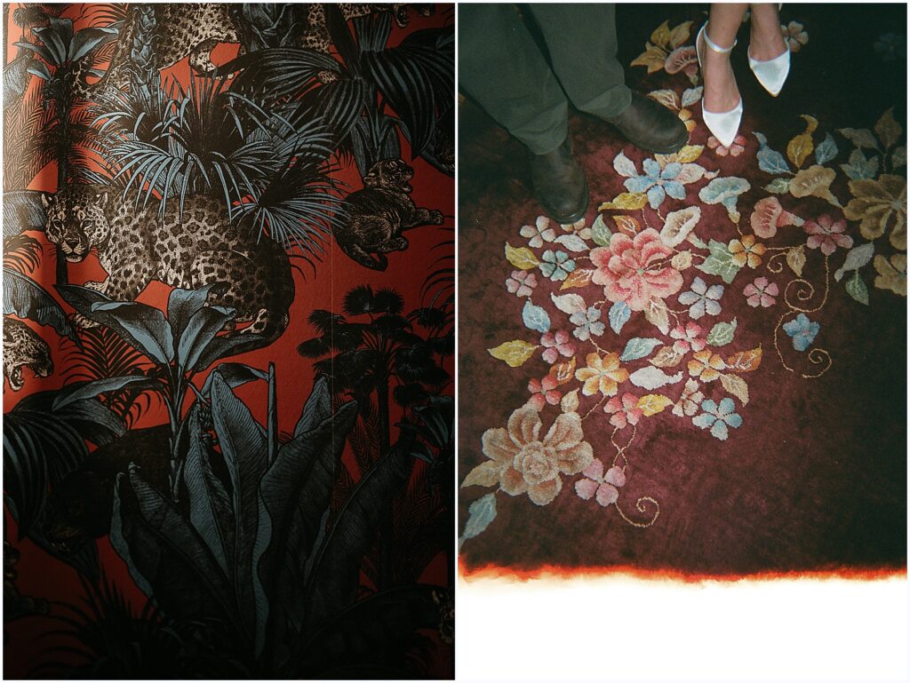 A bride and groom stand on a vintage rug in a film wedding photo.