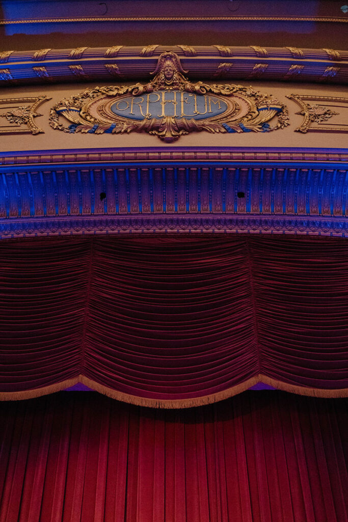 A theater stage with the name Orpheum at the top 