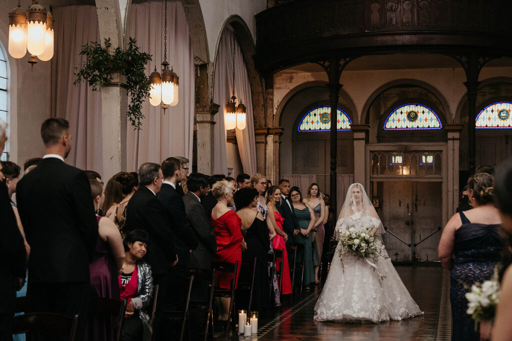 A bride walking down the aisle 