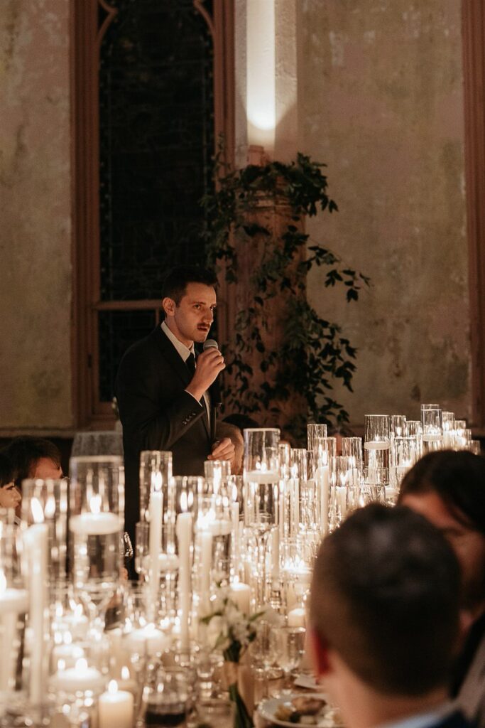 A person giving a toast at a wedding 