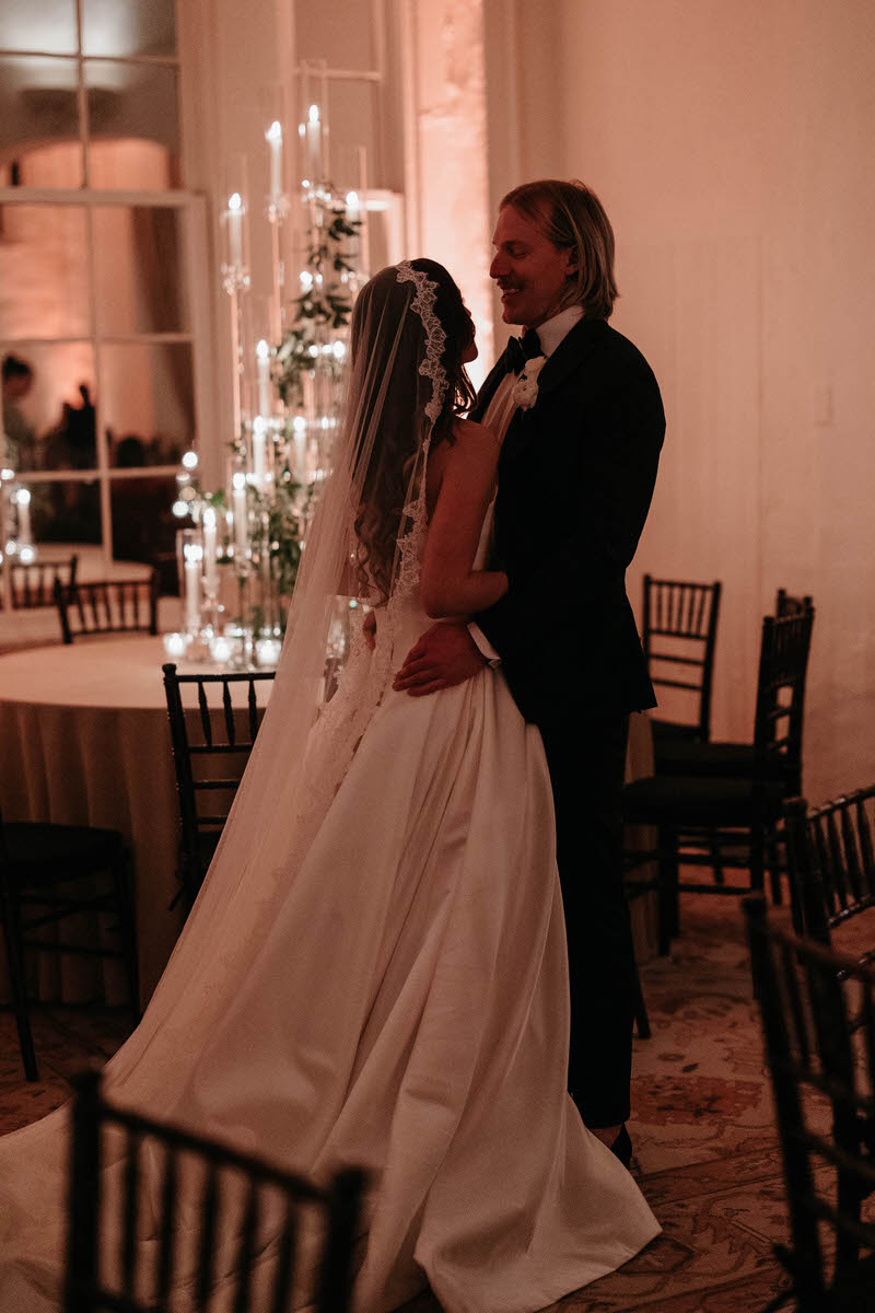 A newlywed couple dancing at their wedding reception at at Latrobe’s on Royal