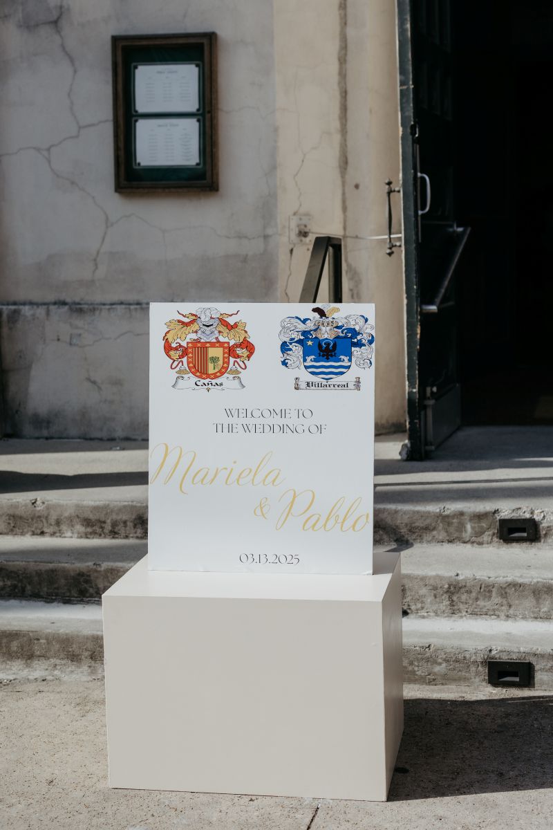 a welcome sign in front of hotel peter and paul in new orleans for a wedding 