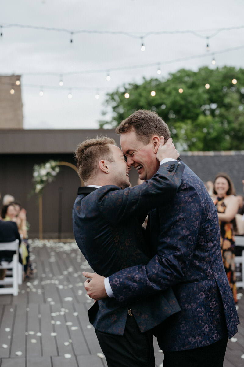 Newlyweds hugging with their foreheads together during their Capulet New Orleans wedding