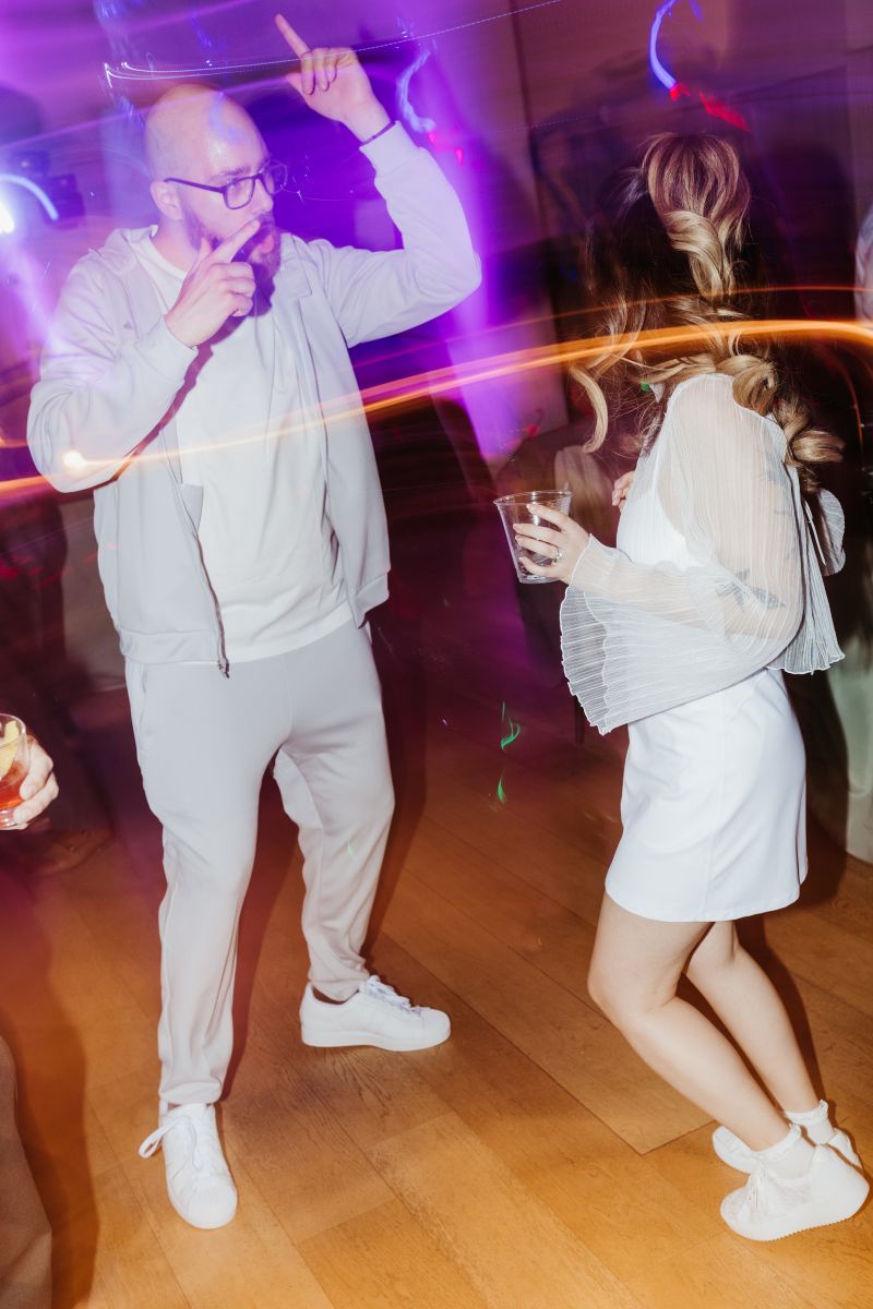 a couple dancing together at their wedding ceremony