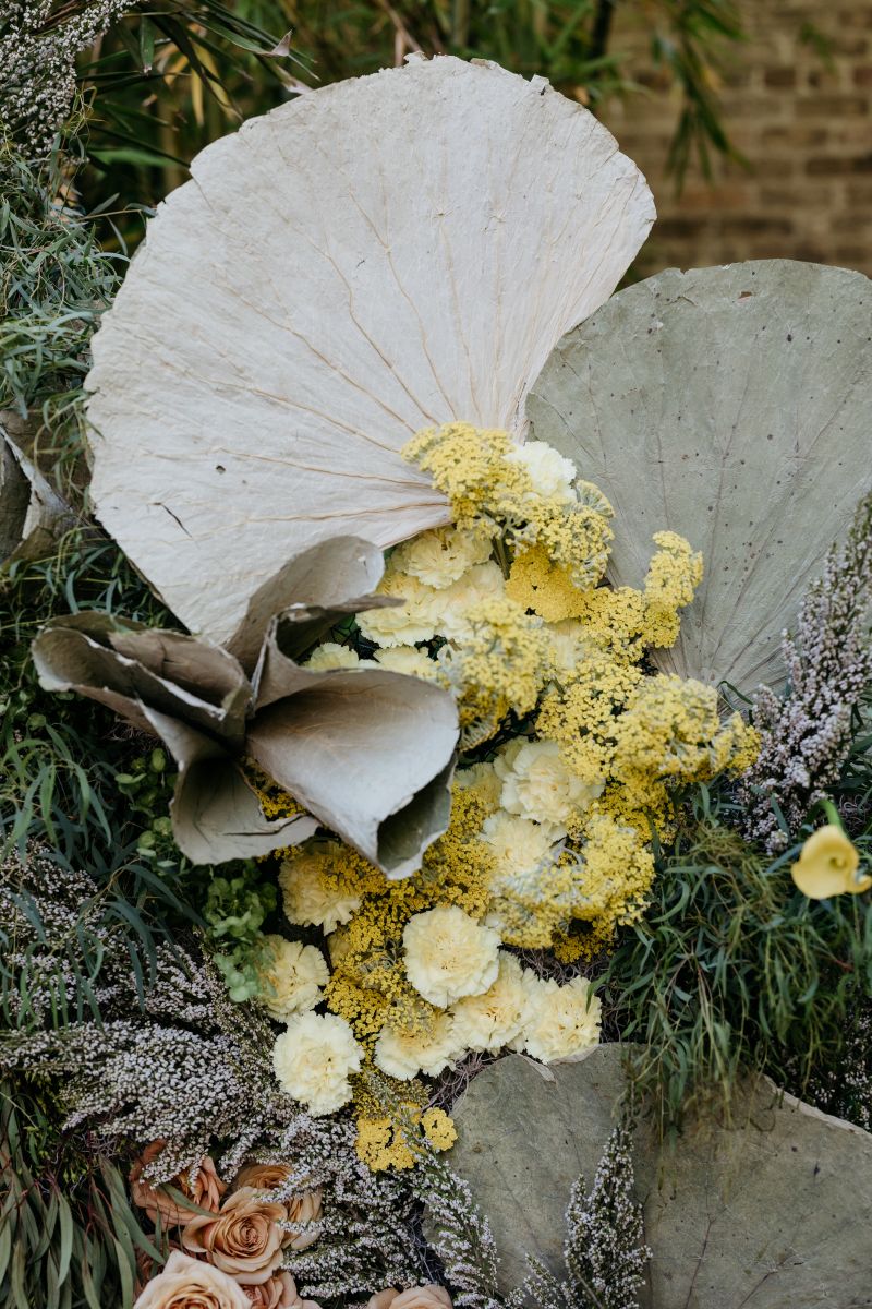 a floral arrangement consisting of plants and flowers